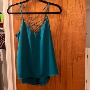 Express cross cross tank in teal size small; never worn without tags